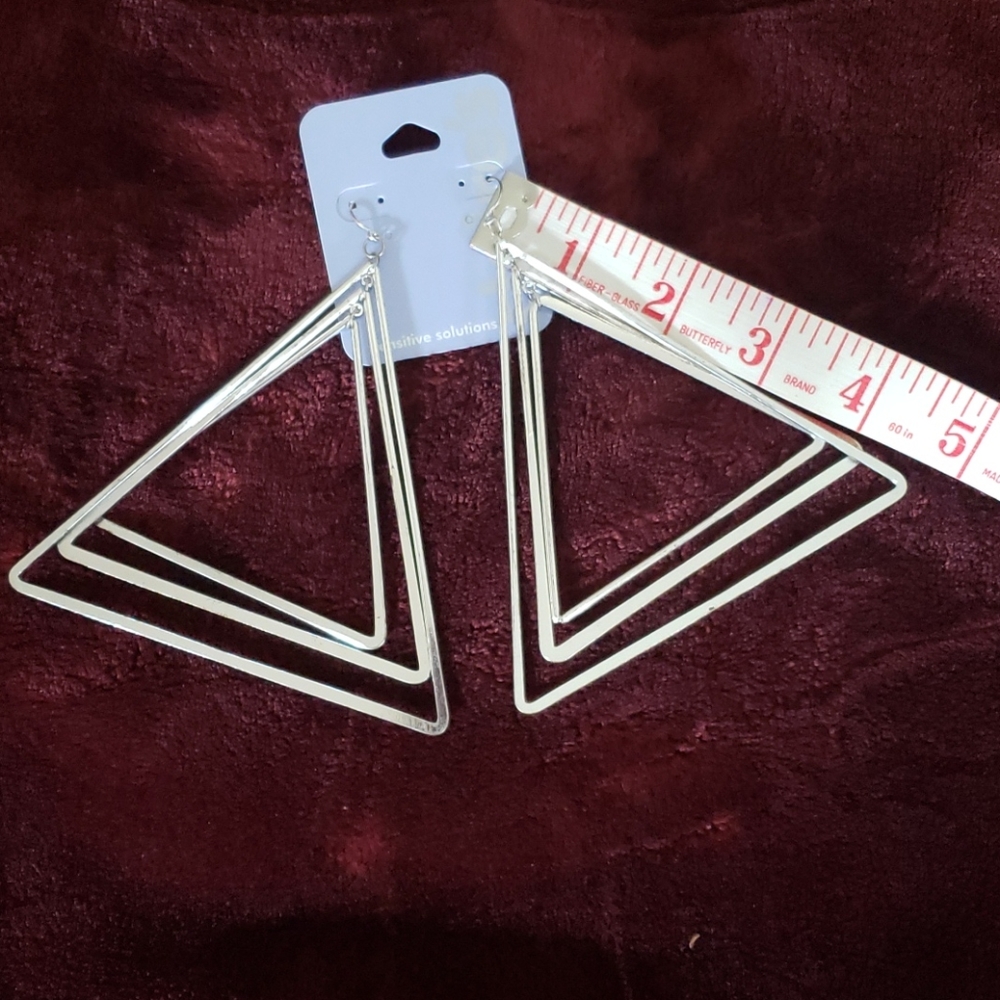 Large silver colored triangle earrings
